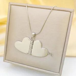 Polished silver titanium steel heart envelope necklace with opening locket on satin