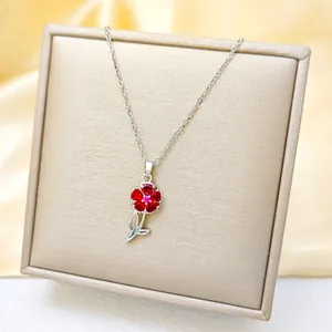 Detailed view of pink zircon sunflower pendant on a luxury titan steel silver chain