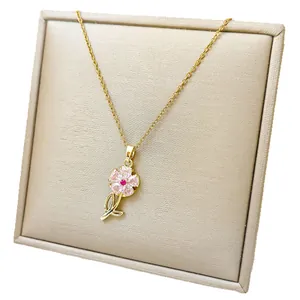Elegant gold titanium necklace with pink zircon sunflower pendant and red center stone