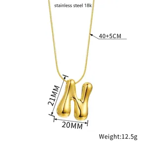Golden 18k stainless steel necklace with puffy balloon N pendant and chain details
