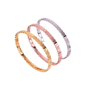 Three-piece titanium steel fish scale texture bangles in gold, rose gold and silver