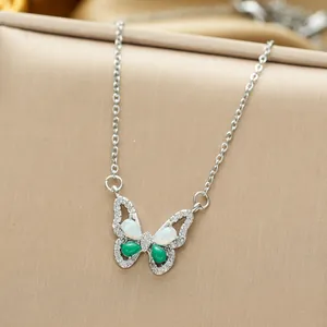 Titanium steel butterfly necklace featuring opal and green gemstone inlay details