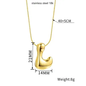Detailed view of puff letter L pendant in 18k gold plated stainless steel with dimensions
