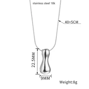 Detailed view of silver puffed pendant with precise measurements and 18k steel material