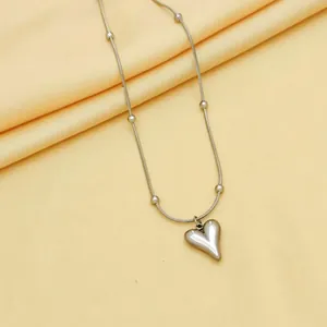 Elegant silver titanium steel heart pendant necklace on a smooth beaded snake chain
