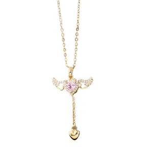 Cupid Angel Wings necklace with pink heart gemstone and sparkling diamond tassels