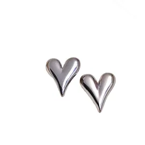 Polished titanium steel irregular heart stud earrings for women in silver finish
