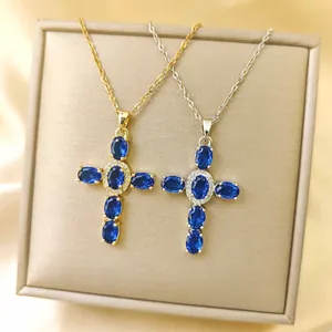 Chic copper cross pendant necklaces with vibrant blue zircon stones in gold and silver finishes