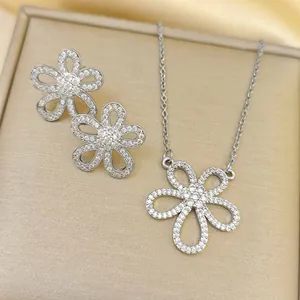 Elegant titanium steel flower necklace and earrings set with white sparkling zircons