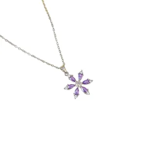 Elegant 18K gold plated snowflake pendant necklace with purple zircon stones for women