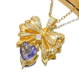 Golden bowknot necklace with zircon and purple heart-shaped pendant for women