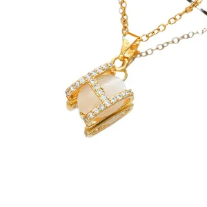 Titanium steel necklace with H-shaped pendant, opal stone and crystals on white background