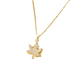 Elegant gold titanium steel necklace with sparkling rhinestone maple leaf pendant for women