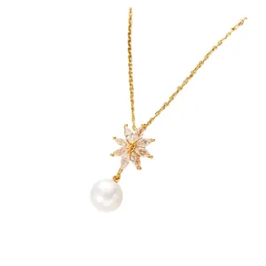 Elegant gold titanium necklace with zircon flower pendant and white drop pearl