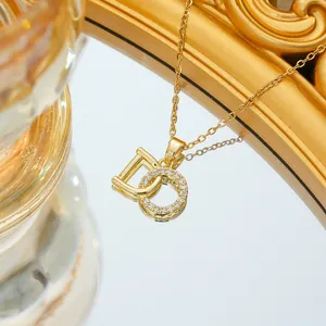 Elegant gold titanium necklace with D-letter zircon pendant and delicate O-chain link