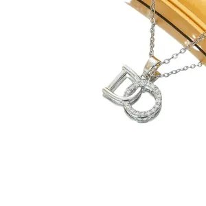 Minimalist silver titanium necklace with interlocking geometric pavé zircon D-shaped pendant