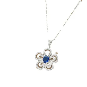 Collana giglio in acciaio al titanio con zaffiro blu e micro-pavé di cristalli