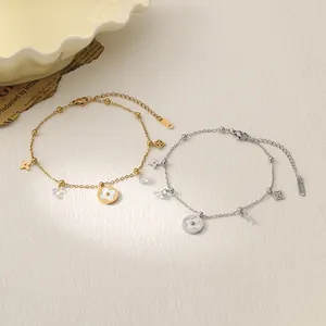 Elegante Gold und Silber Titanstahl Kleeblatt Armbänder mit Zirkonia Anhängern