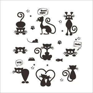 Detail of black cat DIY wall stickers featuring silhouettes stars and paws for home decor