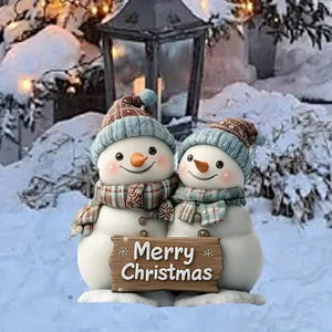 Statue di due pupazzi di neve natalizi in resina con cartello Merry Christmas