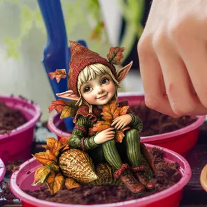 Charming gnome garden stake ornament with autumn leaves for outdoor landscape decoration