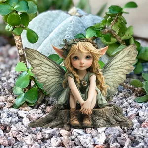 Close-up of a fairy girl figure with translucent wings sitting on a wooden tree stump