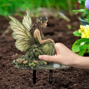Detailed garden fairy statue with leaf dress and wings featuring sturdy outdoor ground stakes