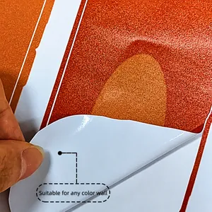 Macro detail of textured orange self-adhesive wallpaper suitable for any color wall