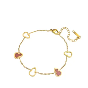 Bracelet gourde en acier titane avec agate rouge et finitions en plaqué or 18k