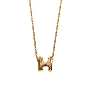 Fashionable gold-tone H-letter pendant necklace with a minimalist link chain for women