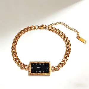 Gold stainless steel chain bracelet featuring a black Greek meander pattern dial charm