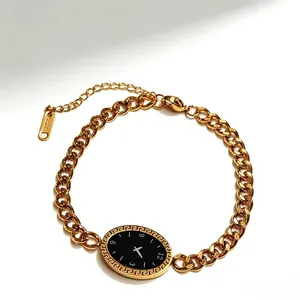 Elegant gold stainless steel bracelet with black Greek fret dial charm and thick chain link