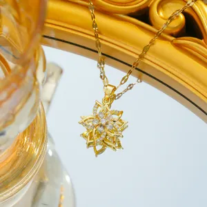 Rotating rose flower pendant necklace in gold plated titanium steel with sparkling crystals