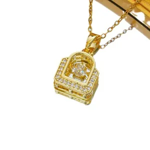 Titanium steel dancing zircon necklace with 18K gold plating on white mirrored background