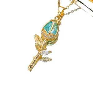 Elegant gold tulip necklace with light blue waterdrop crystal and zircon accents