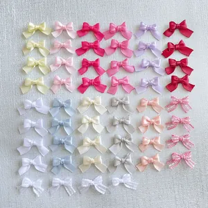 Assorted macaron colored mini ribbon bows for DIY clothing and pet accessories