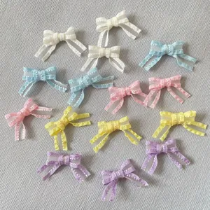 Détails de nœuds en ruban macaron faits main en cinq couleurs pour vêtements et artisanat