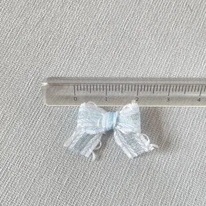 Mini nœud en dentelle bleu clair pour vêtements de poupée DIY largeur 2 cm