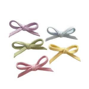 Five macaron colored fabric bowknot accessories for DIY hair clips and clothing decor