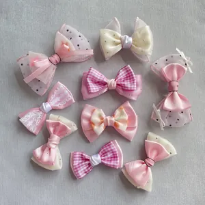 Detailed set of handmade plaid and mesh bow accessories for DIY hair clips and clothing