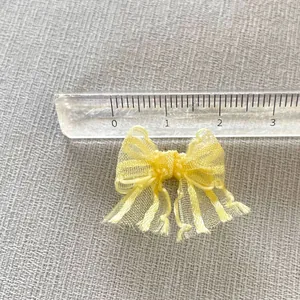 Mini fiocco in nastro di organza gialla per vestiti di bambole e capelli 2.5cm