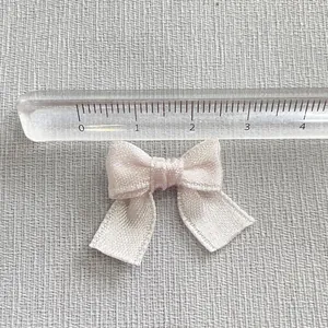 Handmade light pink satin ribbon bow 2.5cm wide for DIY crafts and hair accessories