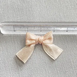 Handmade small pink satin ribbon bow accessory for DIY crafts and hairpins, 3cm width