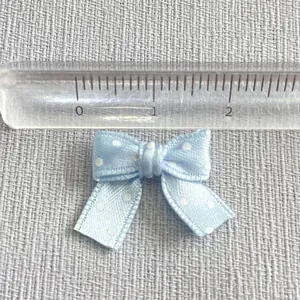 Light blue polka dot ribbon bow accessory for DIY crafts, 2.5cm width measurement