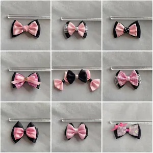 Nueve lazos para el pelo en negro y rosa con encaje y perlas en una cuadrícula ordenada