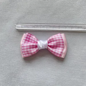 Pink and white checkered mesh bow clip 8cm wide with polyester ribbon material