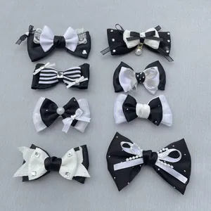 Collection of eight black and white DIY cotton bow accessories with pearls and lace