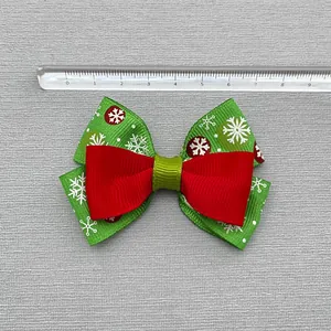 Christmas snowman and snowflake ribbon bow hair accessory with green and red festive layers