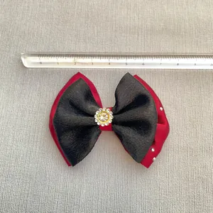 Handmade red and black satin ribbon bow with rhinestones for DIY crafts and hair accessories