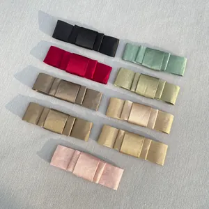 Detail view of 9 multi-color satin ribbon bow accessories for DIY crafts and hair accessories